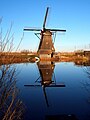 * Nomination Kinderdijk's Windmiles (fixed)--Lucash 17:27, 10 August 2009 (UTC) * Decline  Comment Excellent image, but slightly tilted, can you fix that? -- H005 17:30, 10 August 2009 (UTC)  Done better? -- Lucash 17:53, 10 August 2009 (UTC) Not quite. I'll forgive the chromatic aberration in the twigs that reach the sky because of the excellent mood and overall quality, but I do not promote images w/o geocode (where relevant). -- H005 07:11, 11 August 2009 (UTC) I have realised that this image is an old camera's one and that is not good/big enought, so I will withdraw my nomination and try to take the photo again. -- Lucash 16:21, 11 August 2009 (UTC)