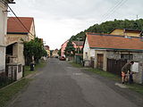 Čeština: Ulice v Litochovicích nad Labem. Okres Litoměřice, Česká republika. English: Street in Litochovice nad Labem village, Litoměřice District, Czech Republic. Personality rights Personality rights warning Although this work is freely licensed or in the public domain, the person(s) shown may have rights that legally restrict certain re-uses unless those depicted consent to such uses. In these cases, a model release or other evidence of consent could protect you from infringement claims. Though not obliged to do so, the uploader may be able to help you to obtain such evidence. See our general disclaimer for more information.