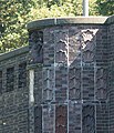 Deutsch: Bauschmuck von Richard Küohl an der Krugkoppelbrücke in Hamburg: Weibliches Meerwesen an der östlichen Bastion der Seite zum Alsterkanal. This is a photograph of an architectural monument. It is on the list of cultural monuments of Hamburg, no. 19579.