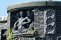 Deutsch: Bauschmuck von Richard Küohl an der Krugkoppelbrücke in Hamburg: Männliches Meerwesen an der östlichen Bastion der Seite zur Außenalster. This is a photograph of an architectural monument. It is on the list of cultural monuments of Hamburg, no. 19579.