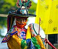 Monk performing the sacred Cham Dance..