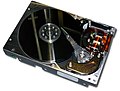 A dismantled 512 Mb hard drive, having several heads and rotating plates