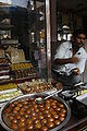 A sweet shop in Varanasi, with Gulab Jamun (bottom).