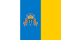 Official flag of the Canary Islands with the Canarian coat of arms