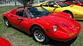 A Ferrari Dino in a Ferrari-only parking lot outside the circuit