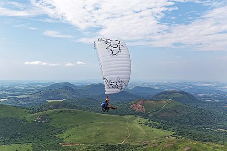 Paraglider on the puy de Dôme, France.