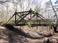 Timber bridge over the former toboggan run/Holzbrücke über der ehemaligen Rodelbahn