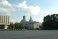 Skyline from the Saxon Square in Warsaw. From left to right: Hotel Victoria, Zug's Protestant Church, Zachęta Art Gallery, Saxon Garden