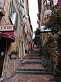 stairs, a narrow street