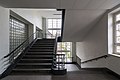 Deutsch: Treppenhaus der Schule Alter Teichweg in Hamburg-Dulsberg. This is a photograph of an architectural monument. It is on the list of cultural monuments of Hamburg, no. 22669.