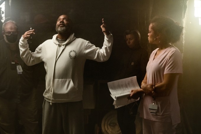 The Deliverance.  (L to R)  Lee Daniels - Director/Producer/Writer and Andra Day as Ebony on the set of The Deliverance.  Cr. Aaron Ricketts/Netflix © 2024