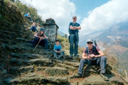 Leo, Colin, Laurent, Mia, Sebastien Pelletier, a local sherpa, and Edith Lemay take a brief rest while trekking to the Poon Hill viewpoint in Nepal. (Credit: MRC/Jean-Sébastien Francoeur)