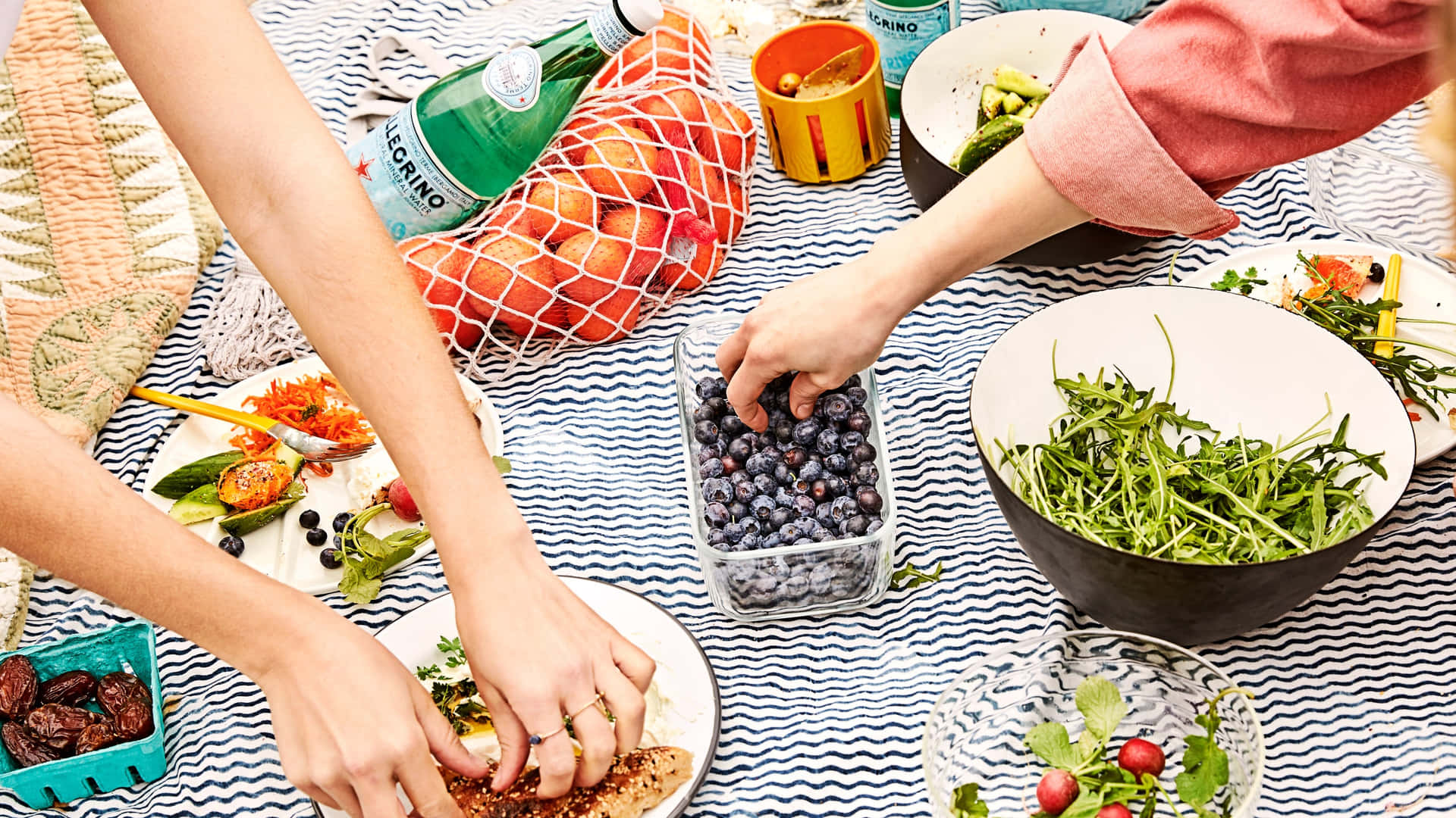 Serene Beach Picnic Setup on a Sunny Day Wallpaper