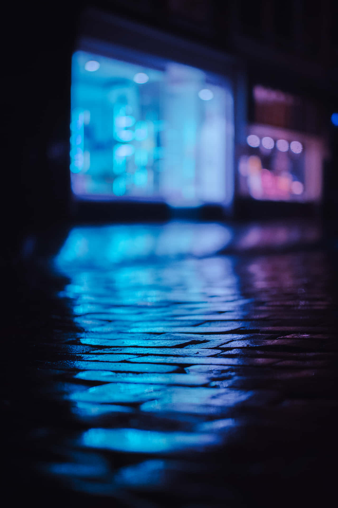 Blue Neon Lights illuminating the night Wallpaper