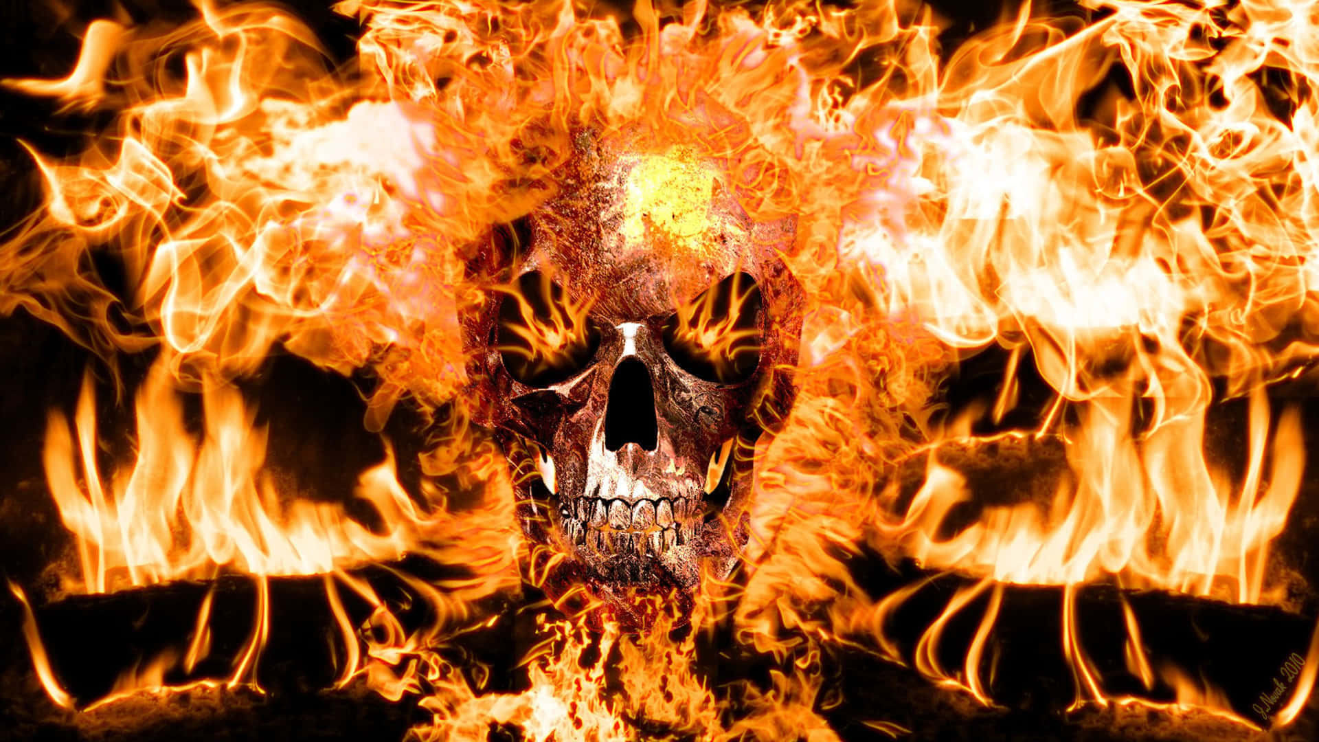 A Skull With Flames On It Wallpaper