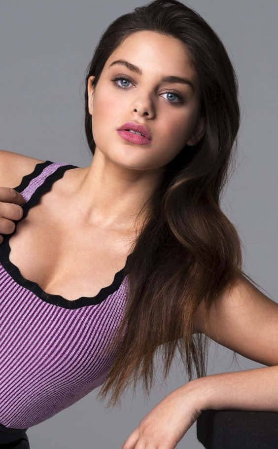 Odeya Rush Posing In Purple Top Wallpaper