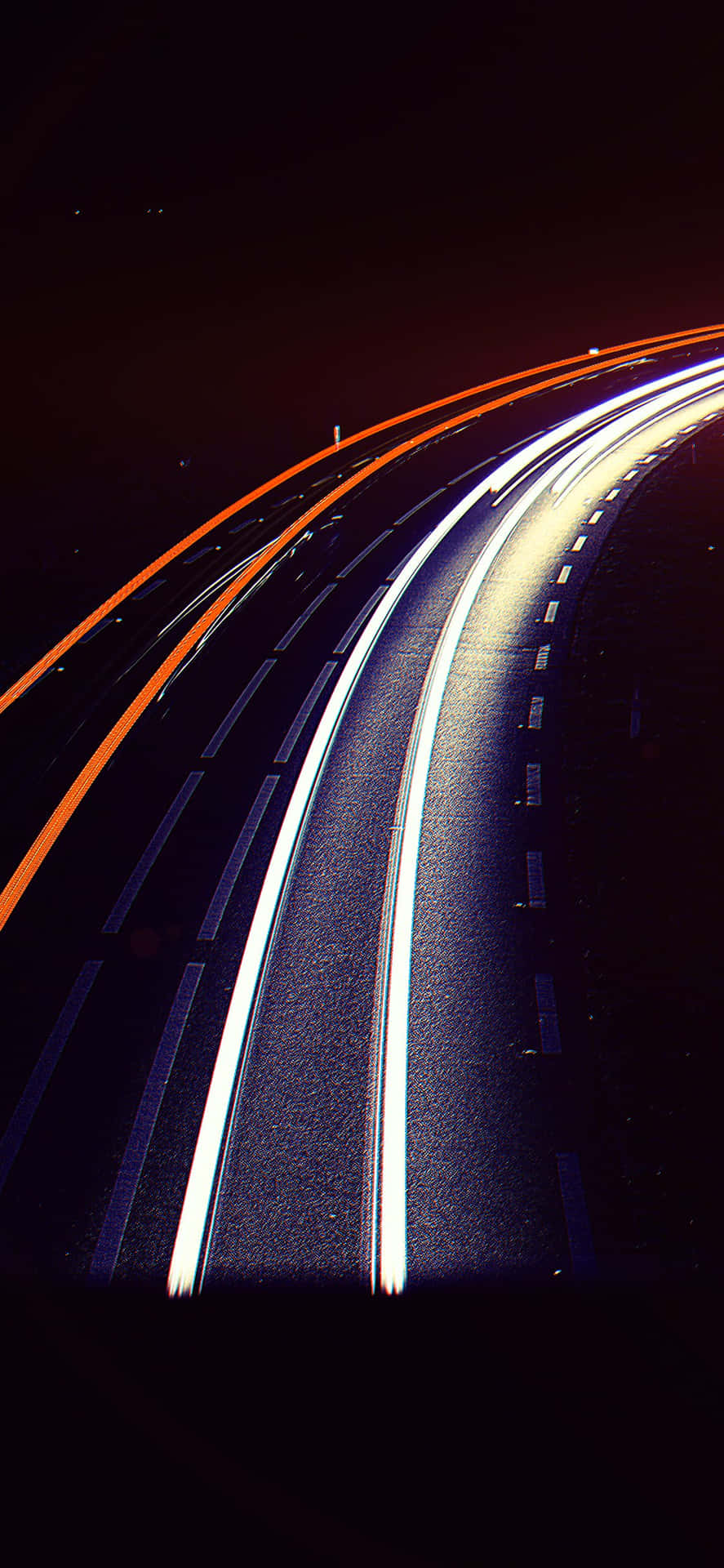 City Streetlight Illuminating an Empty Nighttime Street Wallpaper