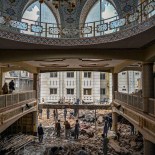 Article thumbnail: Plain-clothed policemen gather over the rubble of a damaged mosque following January's 30 suicide blast inside the police headquarters in Peshawar on February 1, 2023. - A suicide blast at a mosque inside a Pakistan police headquarters was a targeted revenge attack, a police chief said, as rescue efforts ended with the death toll standing at 100. (Photo by Abdul MAJEED / AFP) (Photo by ABDUL MAJEED/AFP via Getty Images)