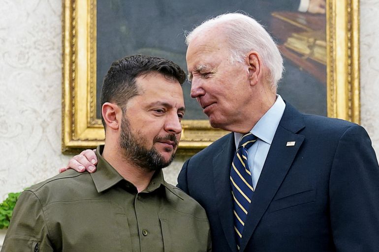 Ukrainian President Volodymyr Zelenskiy is embraced by U.S. President Joe Biden in the Oval Office of the White House in Washington, September 21, 2023. REUTERS/Kevin Lamarque TPX IMAGES OF THE DAY