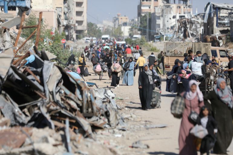 Displaced Palestinians ordered by the Israeli military to evacuate the northern part of Gaza flee amid an Israeli military operation, in Jabalia in the northern Gaza Strip, October 22, 2024. REUTERS/Dawoud Abu Alkas