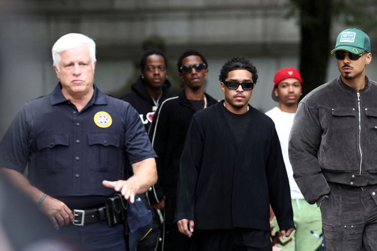 Justin Combs and Quincy Brown arrive at the United States Court in Manhattan after music mogul Sean "Diddy" Combs was arrested by federal agents in New York City, New York, U.S., September 17, 2024. REUTERS/Brendan McDermid