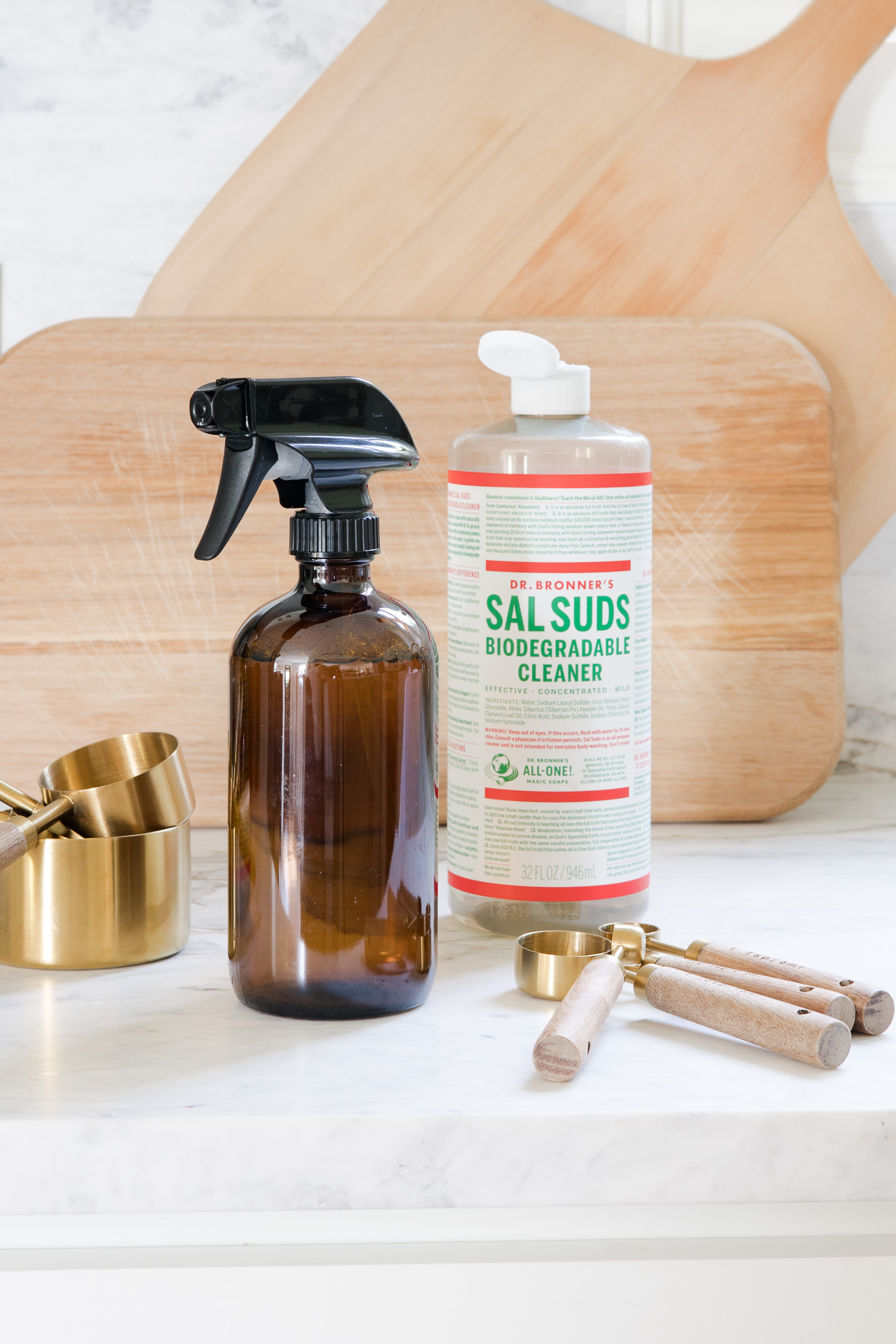 spray bottle and sal suds sitting on counter to make all purpose cleaner