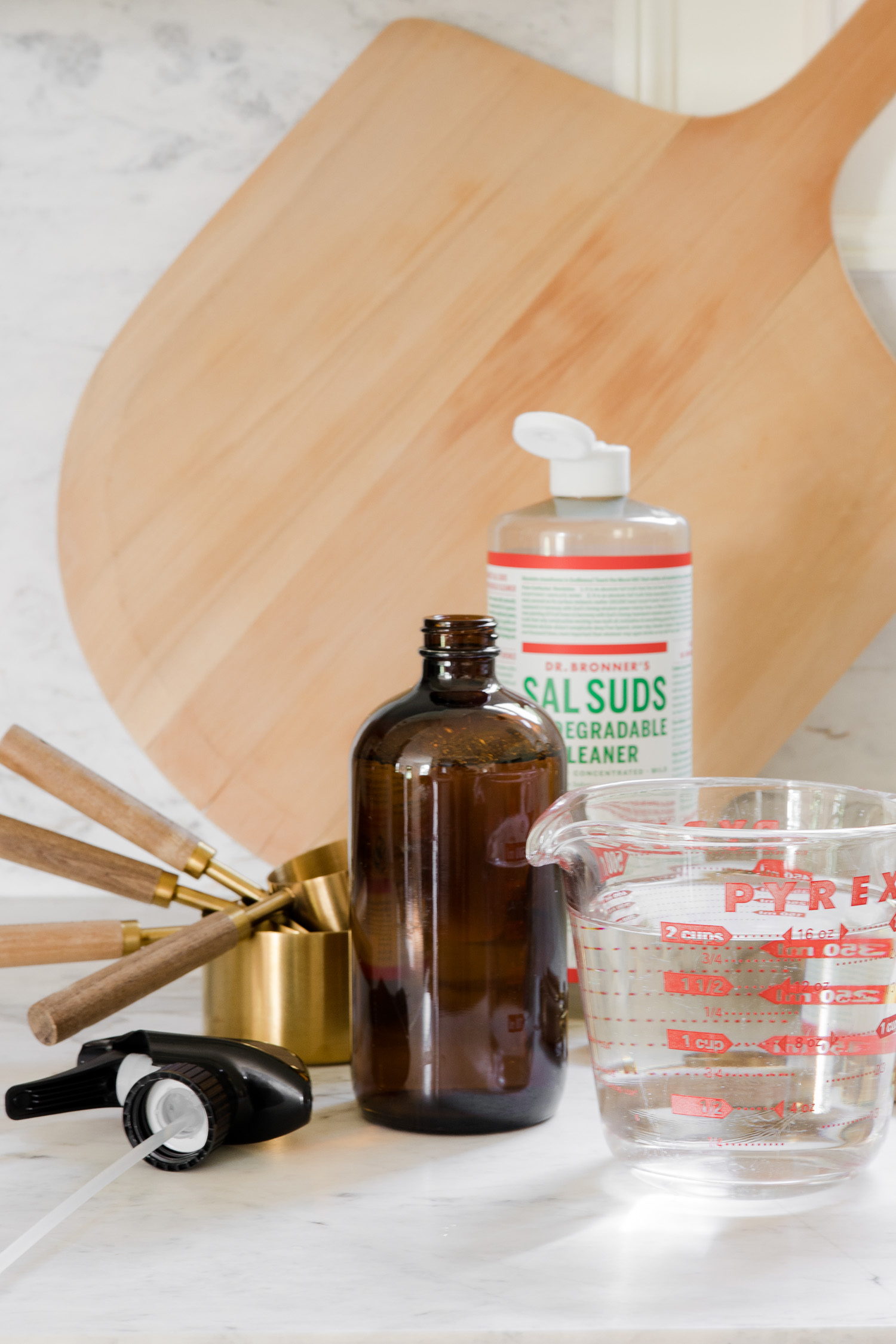 spray bottle and sal suds sitting on counter to make all purpose cleaner