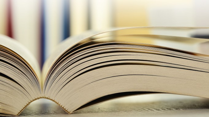 Composition with books on table