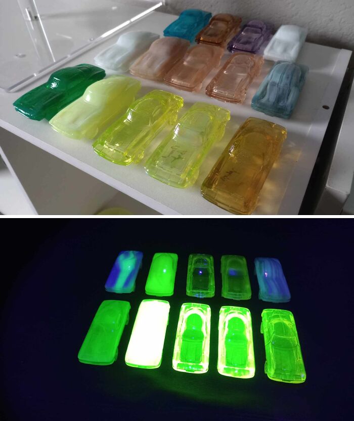 Glowing car-shaped collectibles displayed on a shelf, showcasing an unexpected unique collection.