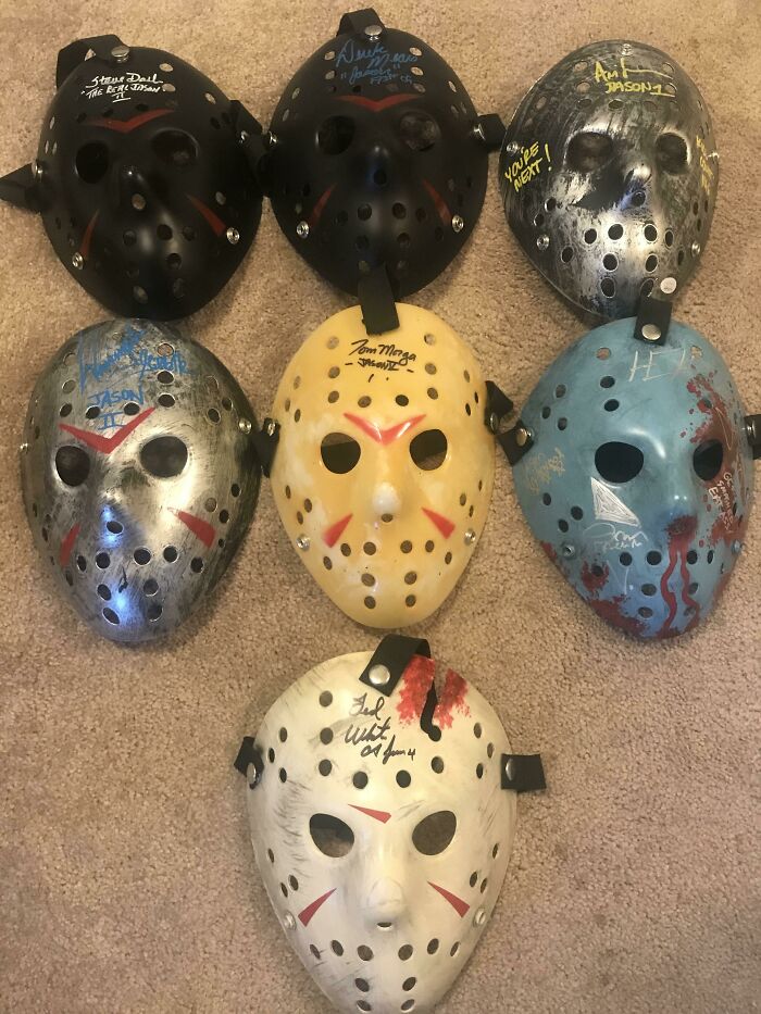 Unique collection of signed hockey masks from various designs, showcasing an unexpected theme.