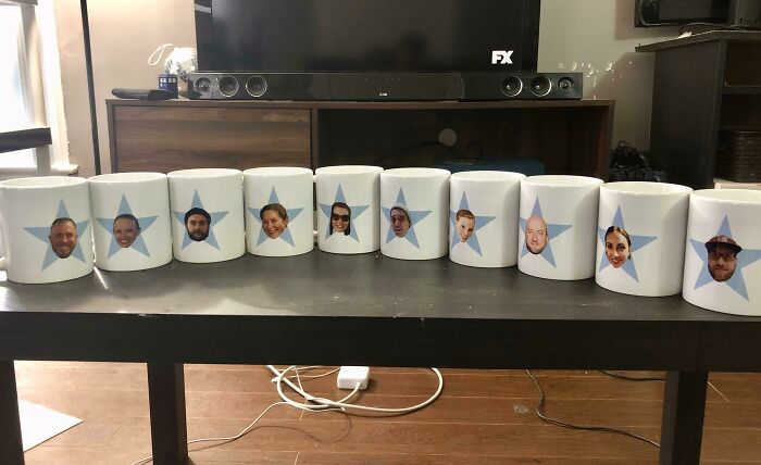 Row of mugs featuring faces, perfect for hilarious trolling Christmas gifts.