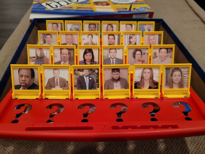 Hilarious trolling Christmas gift: a board game customized with photos of office characters.