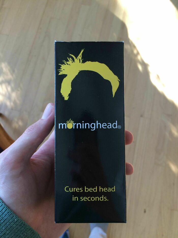 Hand holding a Morninghead box, a funny Christmas gift promising to cure bed head quickly.