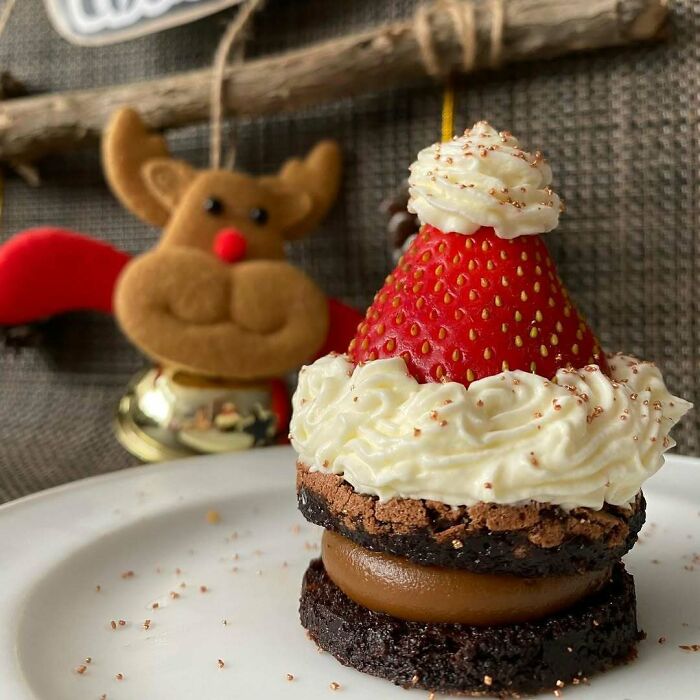 Festive snack with a strawberry Santa hat on a chocolate base, perfect for Christmas snack ideas.