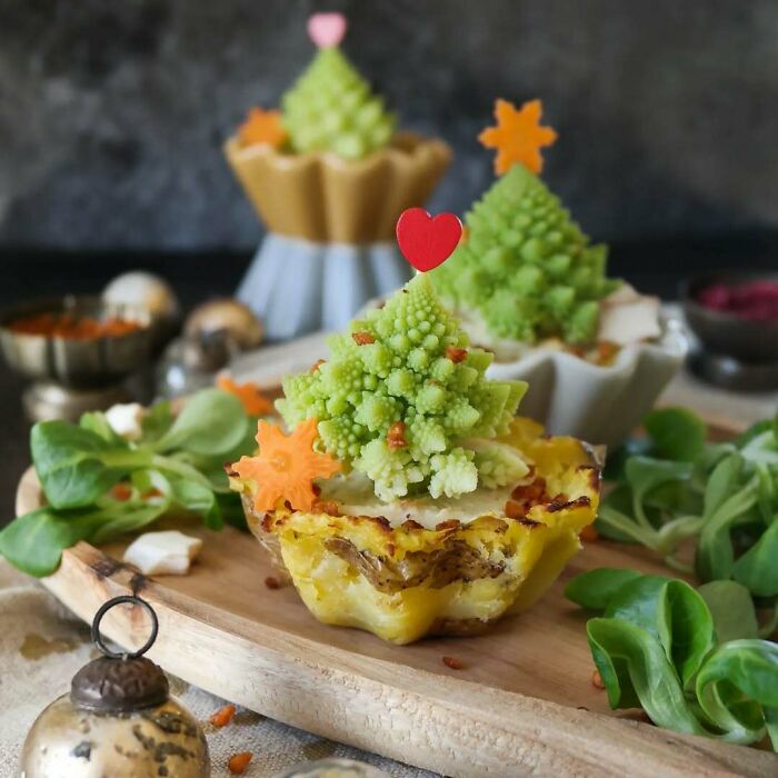 Festive Christmas snack idea with broccoli tree on a savory tart, decorated with carrots and a heart topper.