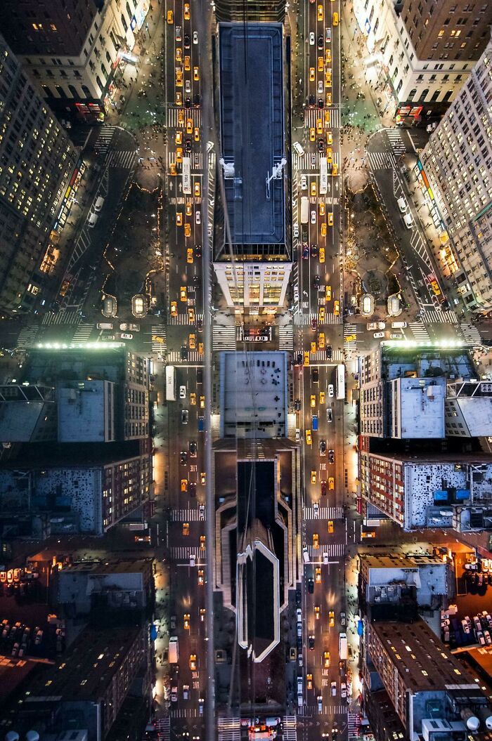 I Leaned Over The Roof Of A Skyscraper To Capture This Reflection Of NYC