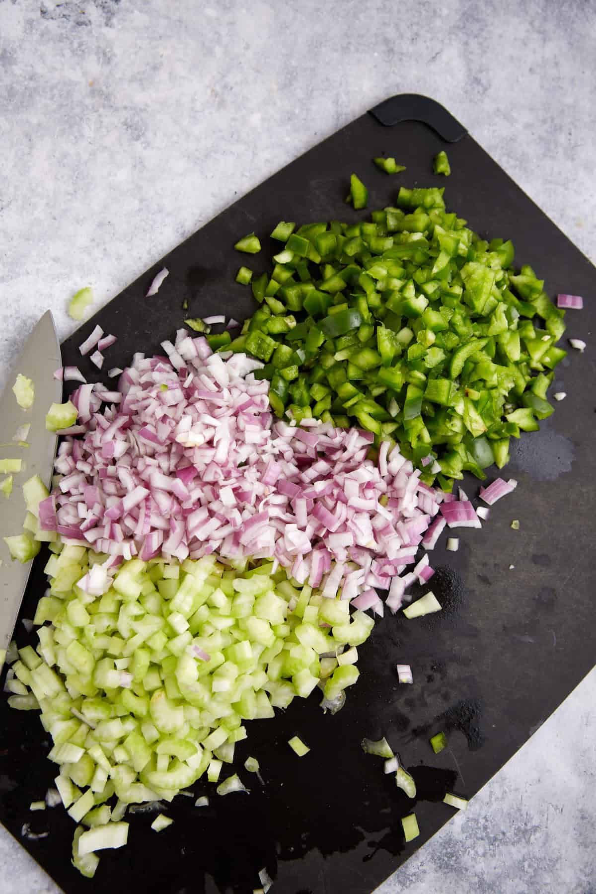 Chopped vegetables on a cutting board.