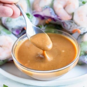 A spoon is used to serve this easy peanut sauce.