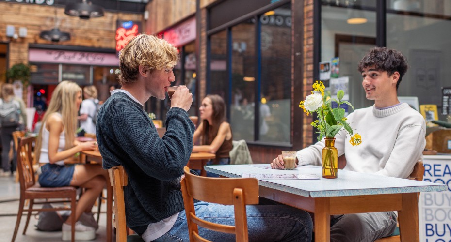 Students at Real McCoy coffee shop