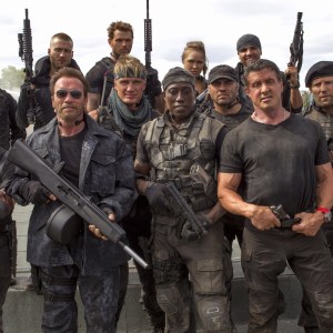 THE EXPENDABLES 3, from left: Jet LI, Antonio Banderas, Glen Powell, Arnold Schwarzenegger, Kellan Lutz, Dolph Lundgren, Wesley Snipes, Ronda Rousey, Randy Couture, Victor Ortiz, Sylvester Stallone, Jason Statham, on set, 2014. ph: Phil Bray/©Lionsgate/courtesy Everett Collection