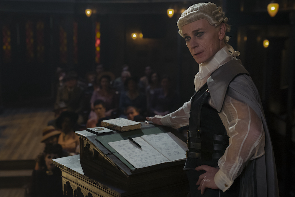 Ben Daniels as Santiago in 'Interview with the Vampire' Season 2, Episode 7, shown here wearing a white wig as the prosecutor in a staged 'trial'