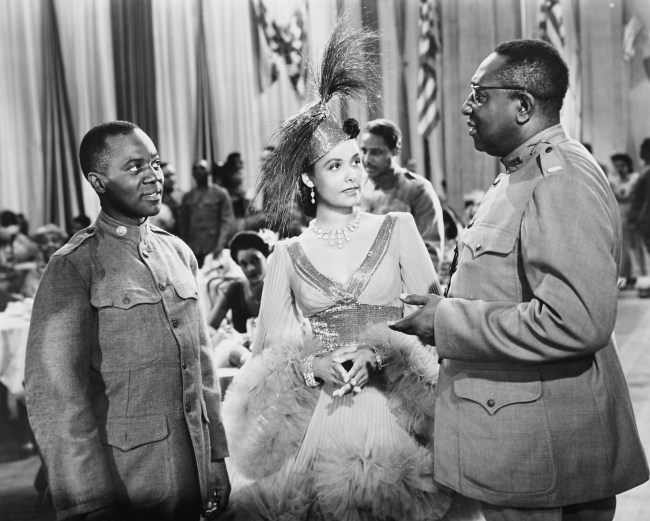 STORMY WEATHER, left: Bill Robinson; center: Lena Horne, 1943. TM & Copyright ©20th Century-Fox Film Corp. All rights reserved/courtesy Everett Collection