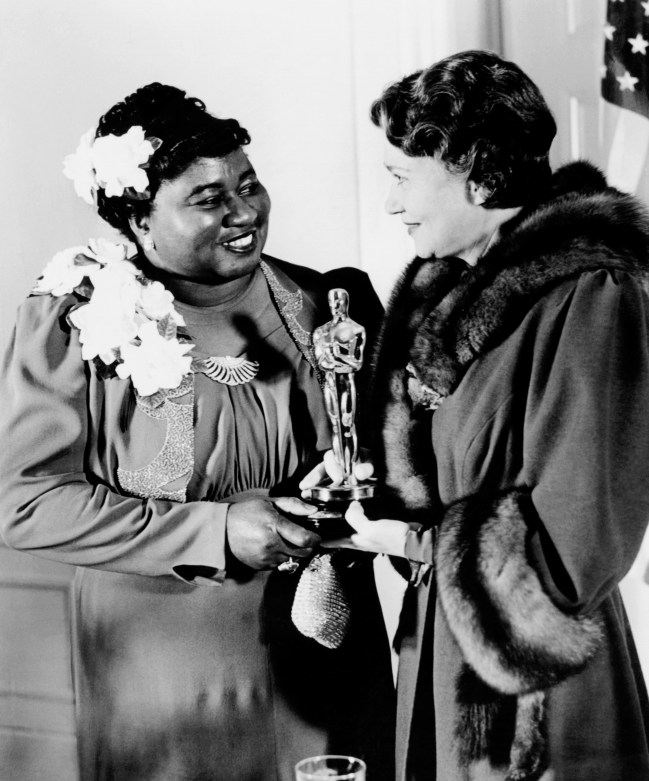 Hattie McDaniel, left, accepting her Best Supporting Actress Oscar (for GONE WITH THE WIND) from Fay Bainter, February 29, 1940