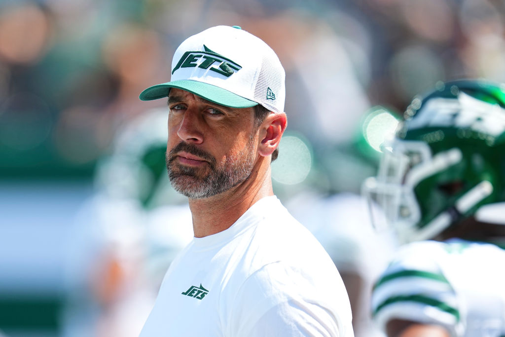 EAST RUTHERFORD, NEW JERSEY - AUGUST 10: Aaron Rodgers #8 of the New York Jets looks on prior to the preseason game against the Washington Commanders at MetLife Stadium on August 10, 2024 in East Rutherford, New Jersey. (Photo by Mitchell Leff/Getty Images)