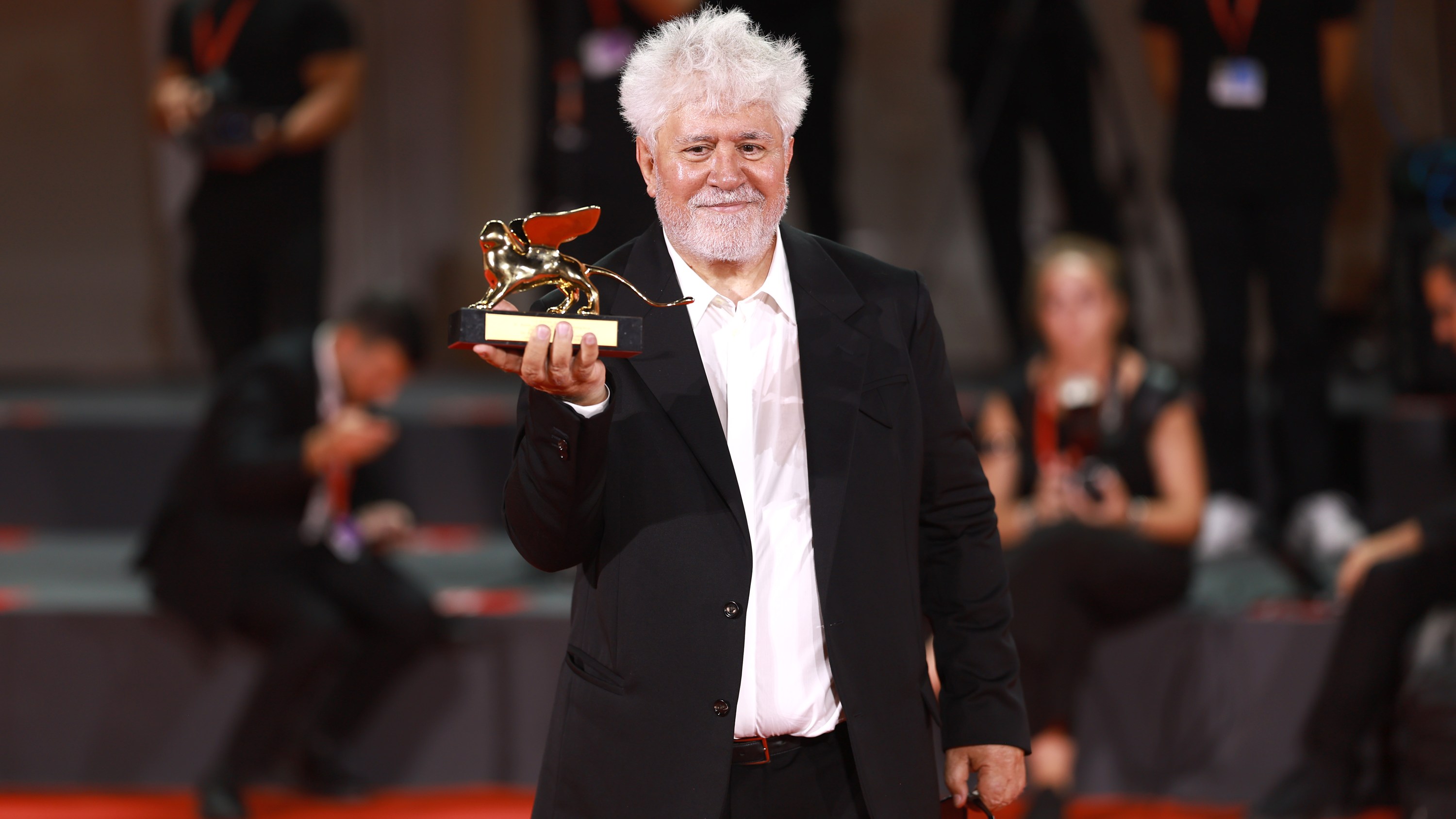 VENICE, ITALY - SEPTEMBER 07: Pedro Almodovar poses with the Golden Lion Award for 'The Room Next Door' Award during the 81st Venice International Film Festival at Palazzo del Cinema on September 07, 2024 in Venice, Italy. (Photo by Matt Winkelmeyer/Getty Images)