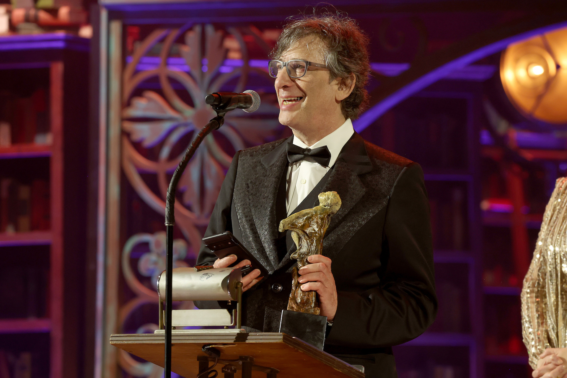 Neil Gaiman accepts the Visionary Award onstage during The Art of Elysium's 25th Anniversary HEAVEN Gala at The Wiltern on January 06, 2024 in Los Angeles