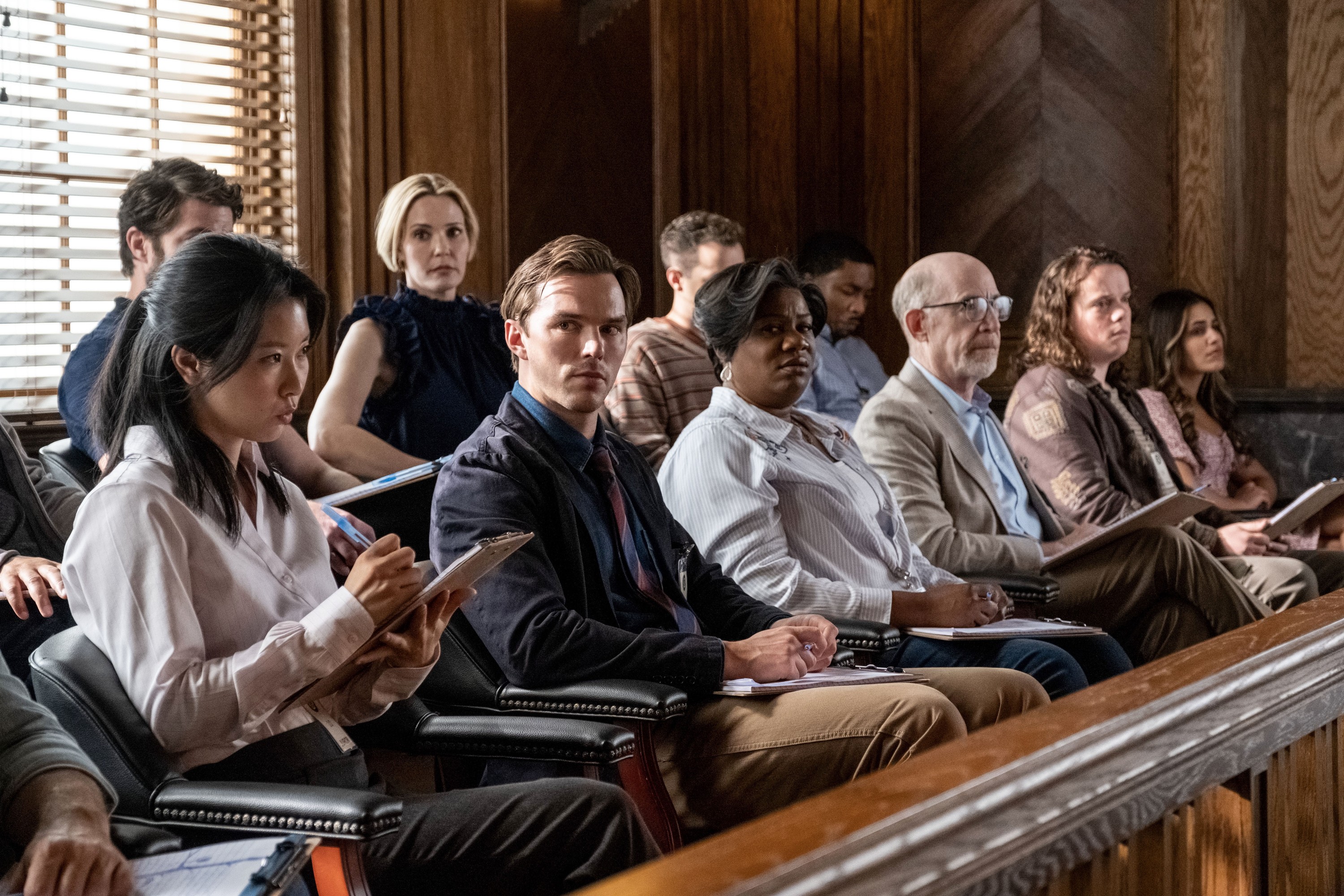 JUROR #2, (aka JUROR NUMBER 2), center, from left: Leslie Bibb, Nicholas Hoult, Adrienne C. Moore, J.K. Simmons, 2024. ph: Claire Folger /© Warner Bros. / Courtesy Everett Collection