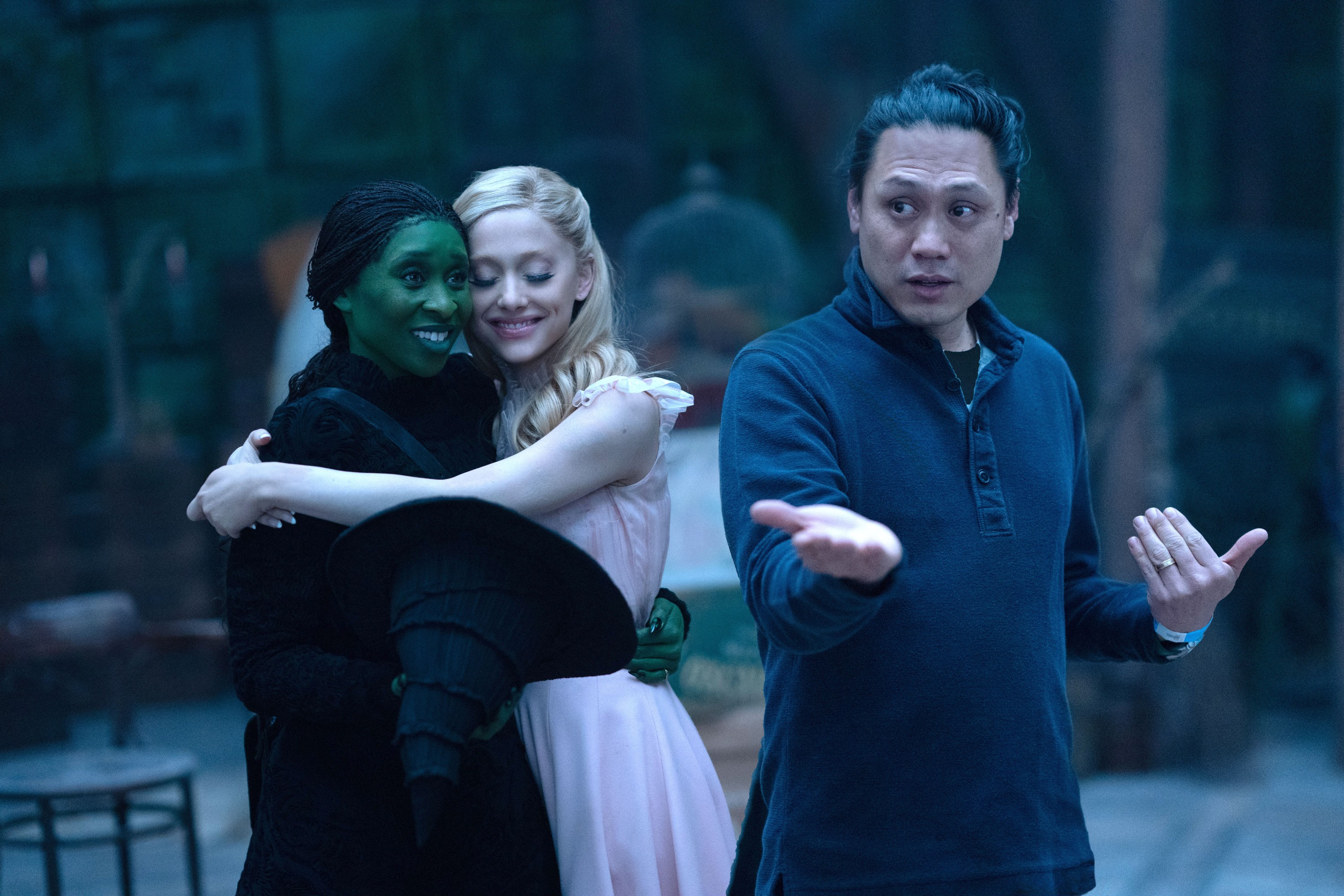 Cynthia Erivo, Ariana Grande, director Jon M. Chu, on set of 'Wicked'