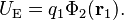 U_\mathrm{E} = q_1 \Phi_2(\mathbf r_1).