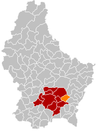 Map of Luxembourg with Schuttrange highlighted in orange, the district in dark grey, and the canton in dark red